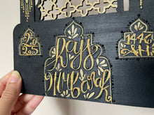 Load image into Gallery viewer, Hajj Celebrations and Commemorative Gift Bundle. Hand Painted in Black and Gold. Banners, Star Garland and Personalised Plaque