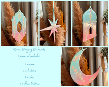 Load image into Gallery viewer, Set of decorative hanging ornaments including a moon, lanterns, and stars against a light blue background.