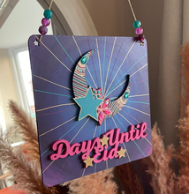Load image into Gallery viewer, Decorative sign with 'Days Until Eid' text and star design, hanging indoors.