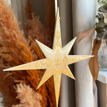 Load image into Gallery viewer, Decorative star hanging ornament with a neutral background