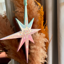 Load image into Gallery viewer, Decorative star hanging above a vase with dried plants