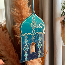 Load image into Gallery viewer, Decorative blue lantern hanging among pampas grass indoors