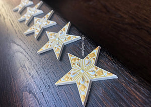 Ivory stars with white and gold detail